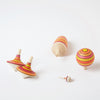 Set of 5 red Spinning Tops from Mader | Conscious Craft
